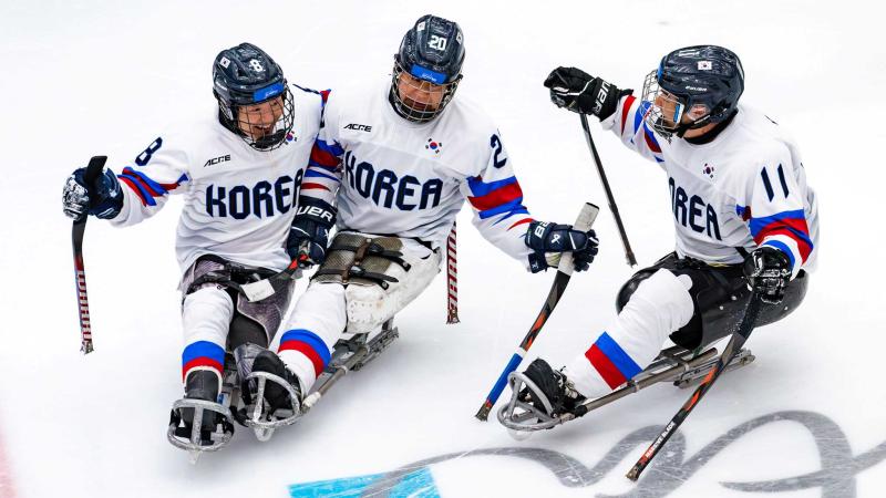Athletes celebrate in joy